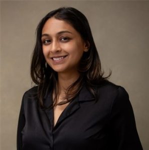 A photo of a woman wearing a black shirt