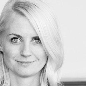 A black and white photo of a woman with blond hair